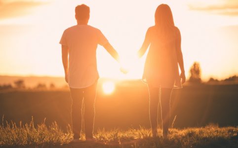 people, holding hands, sunset